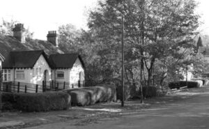A black and white photograph showing the listed flats on Ravenhurst Road